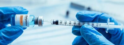 sterile ketamine hydrochloride vial and intravenous infusion preparation in medical environment